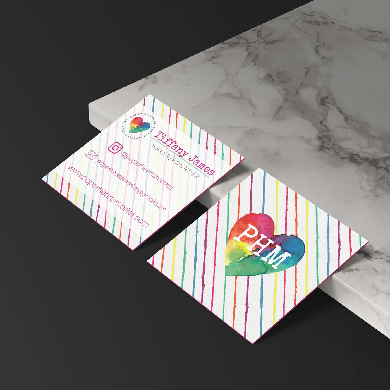 Home Page mockup of the Paper Hearts Market website on a hand painted striped background