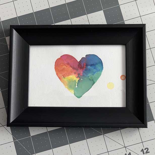 Watercolor heart in a picture frame that was sent as a gift to the client